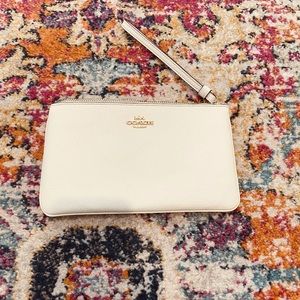 White Coach Wristlet. Pristine condition.